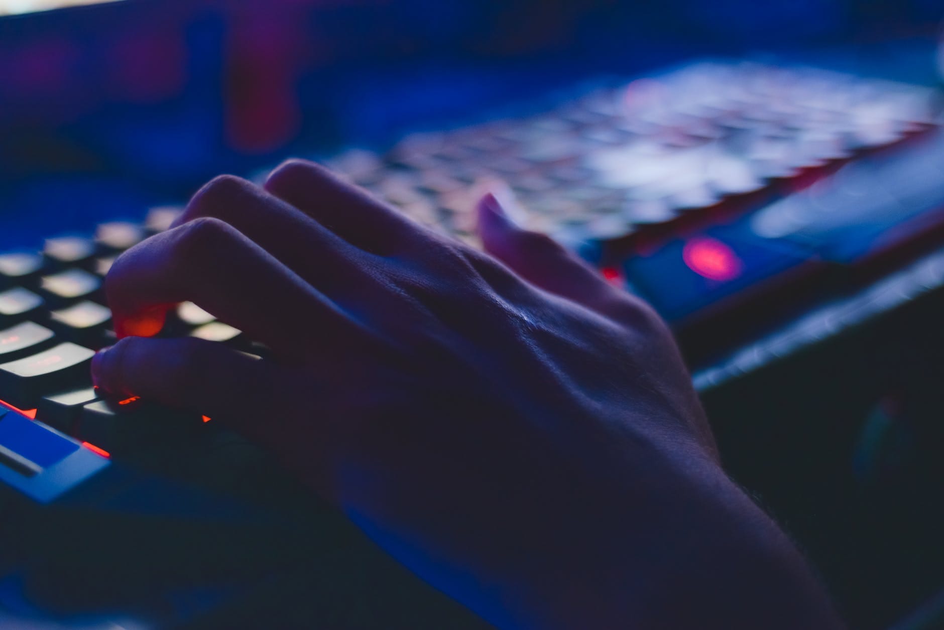 photo of person typing on computer keyboard learning cybersecurity non techies.