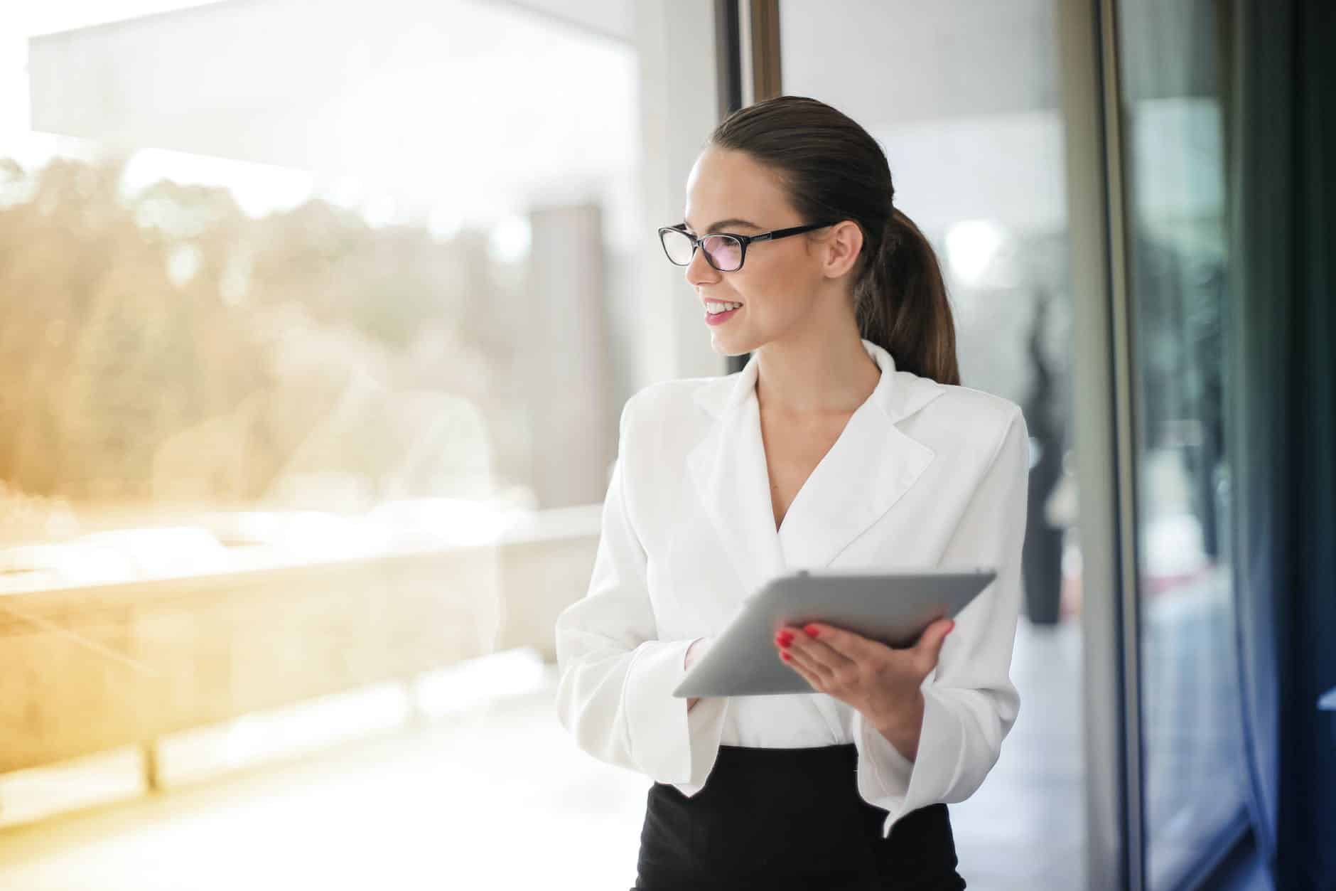 photo of woman wearing white blazer