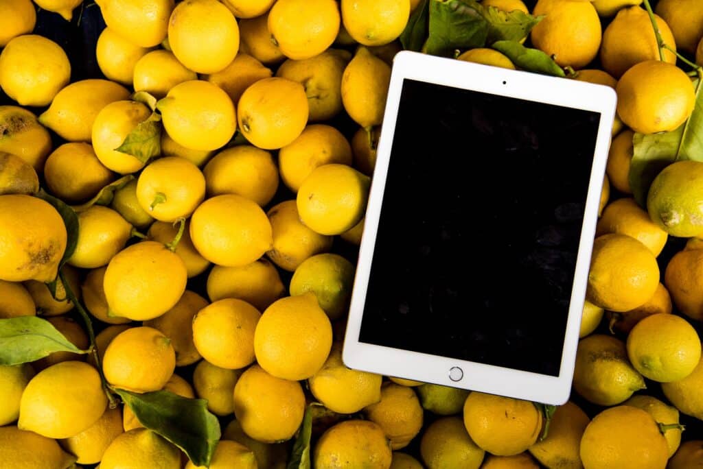 photo of ipad on pile of lemons