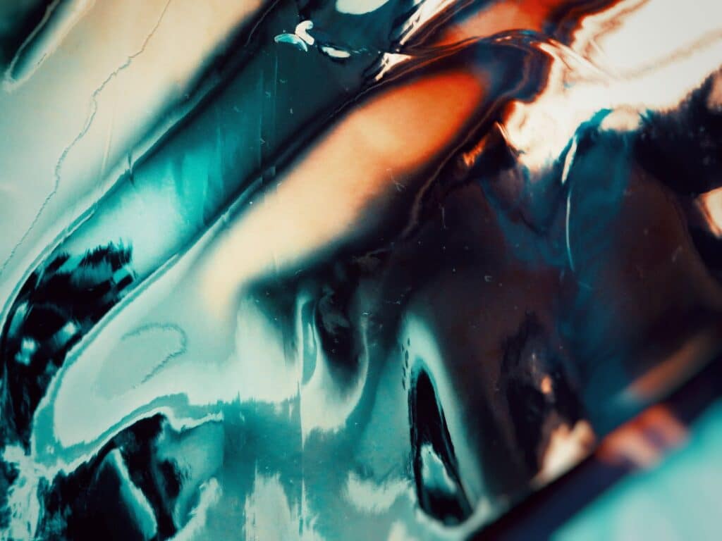 close up photo of blue liquid