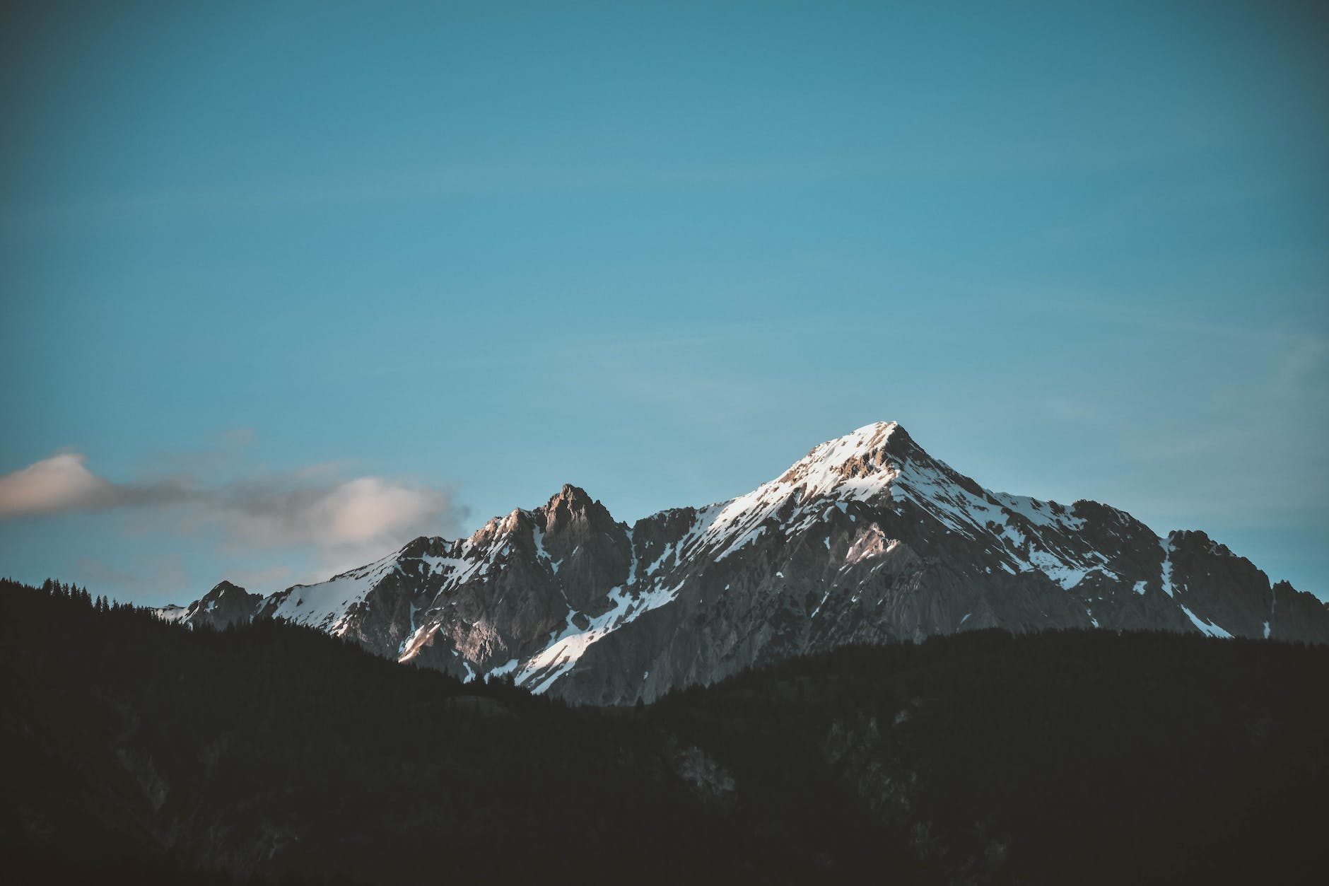 snow top mountain under clear sky